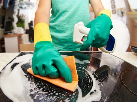 Carpet cleaning team demonstrating safe working practices